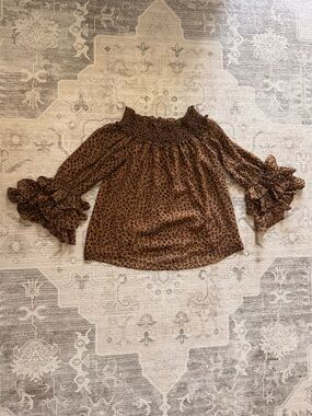 CECE Animal Print  Ruffle-Sleeve Smocked Neck Blouse